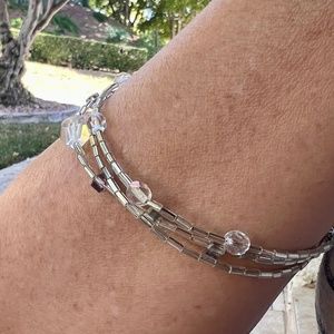 Triple Strand Silver colored and Clear Beaded Bracelet